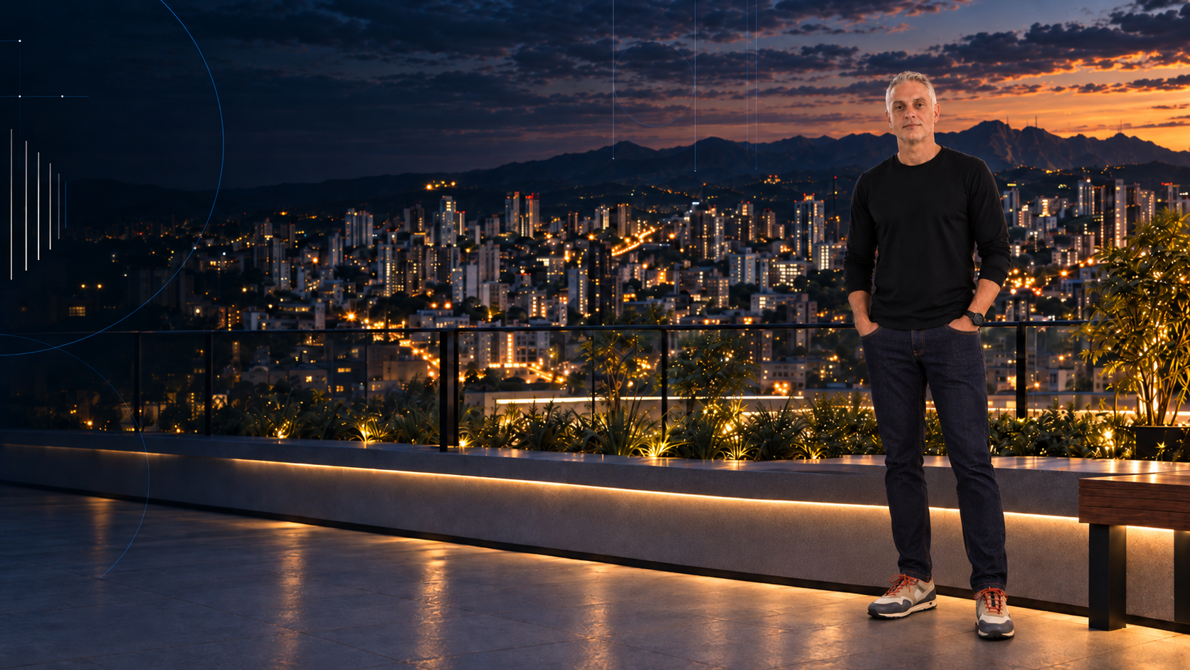 Profissional em um terraço ao anoitecer, com a cidade iluminada ao fundo